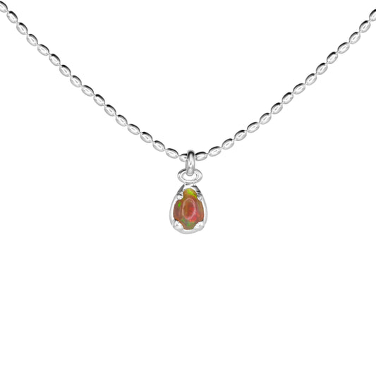 Silver necklace with a teardrop-shaped pendant on a white background